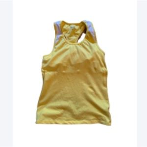 Women’s Champion workout top. Yellow and white. Inside has polka dots. Medium